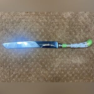 Vintage  A.E. Lewis porcelain-handled cake serving knife.